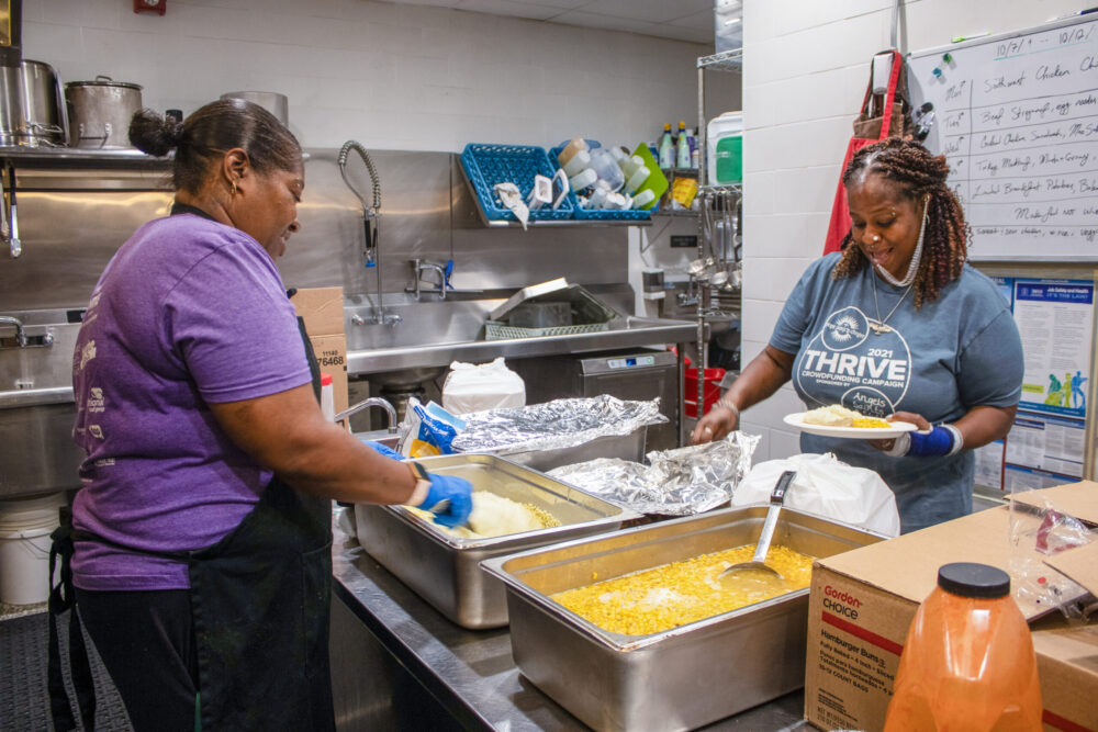 kitchen volunteers at Bridge Housing Campus